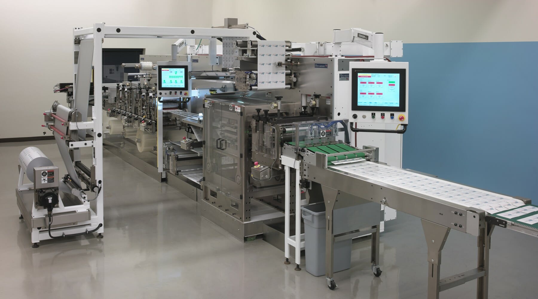 Medical converting and packaging machine